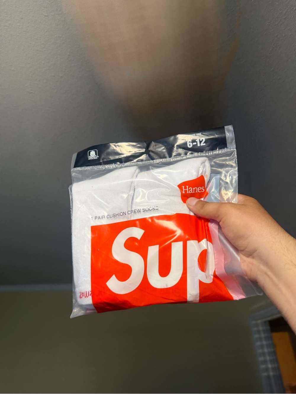 Hanes White Crew Socks with Red Logo Packaging